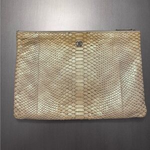 CHANEL Quilted iridescent python clutch